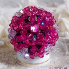 Hibiscus ring with facets and spinners in Swarovski crystal